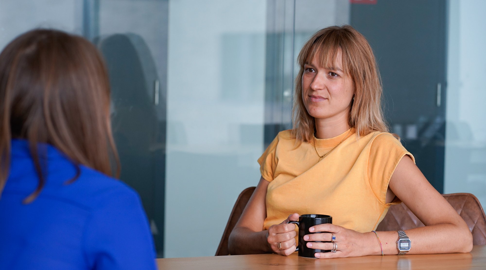 ML6 Gent Office employees discussing