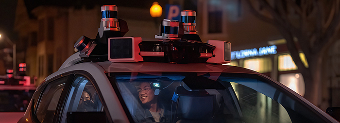 LiDAR sensors mounted on top of an autonomous driving car.
