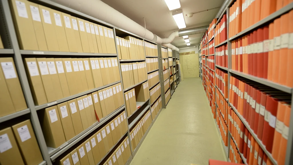 “250 metres of material.” That’s rows upon rows of files, still sitting in the police archive today