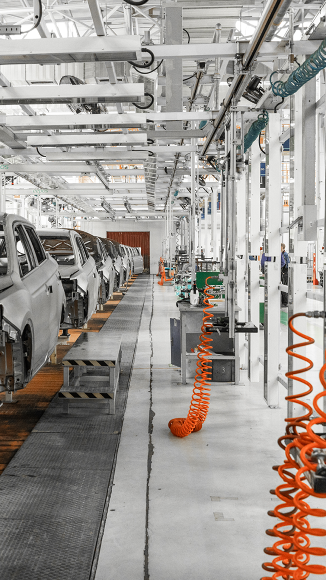Plant for production of cars. Modern automotive industry. Electric car factory, conveyor.