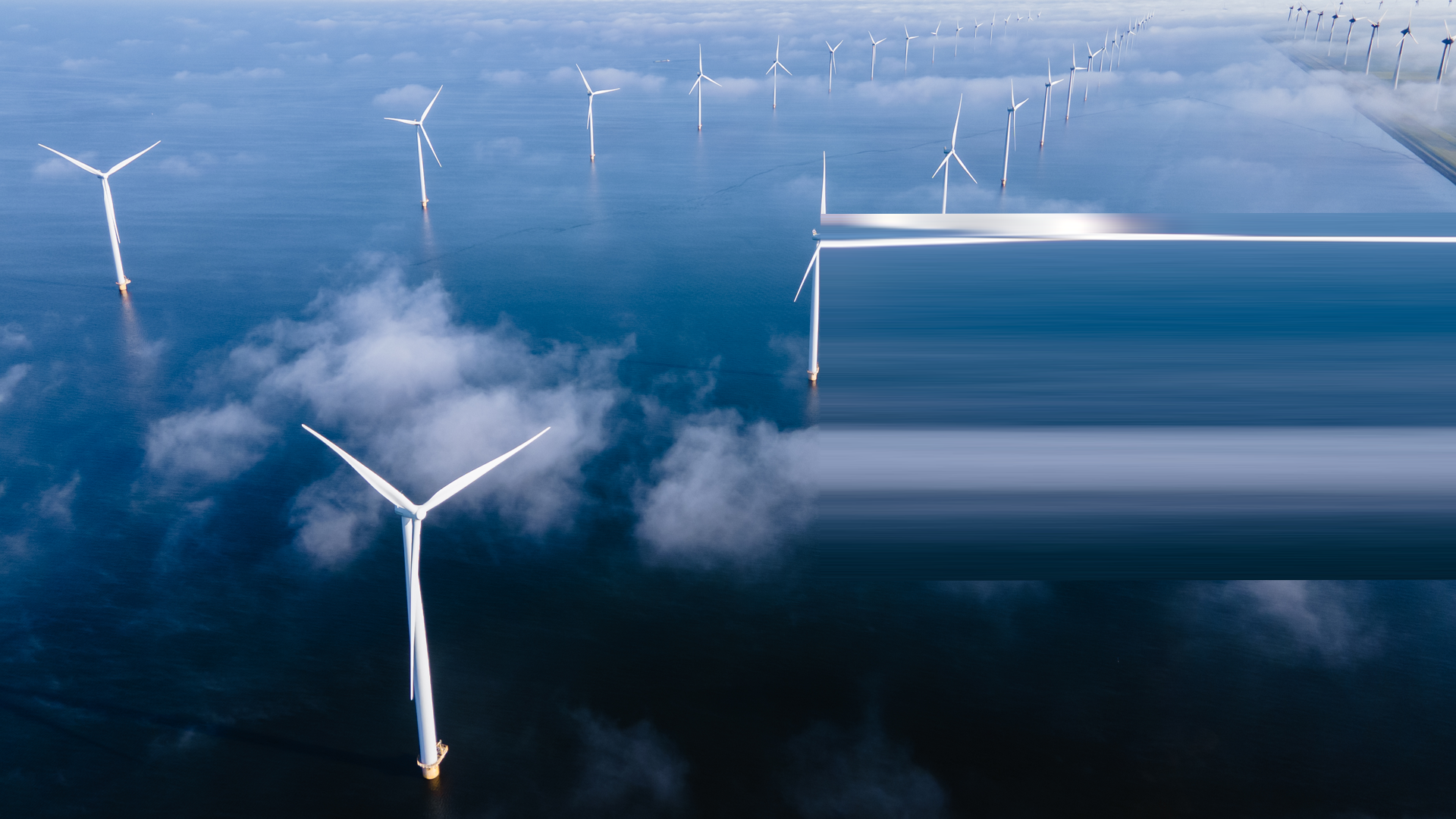 otary_Windmill turbines at sea a huge winmill park in the Netherlands during winter By fokkebok 2_envato
