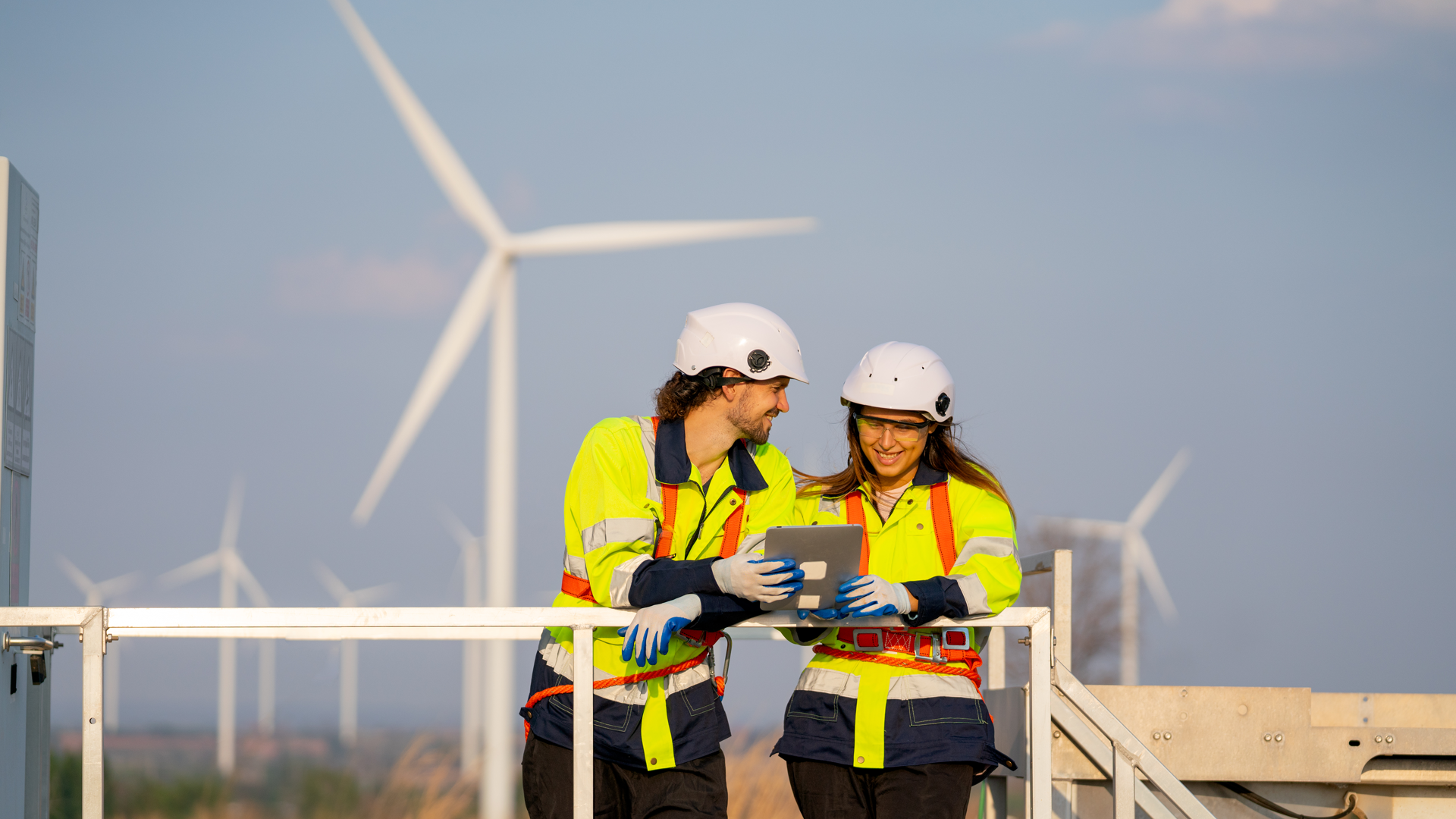 engineer man and woman discuss with happiness together with woman hold tablet
