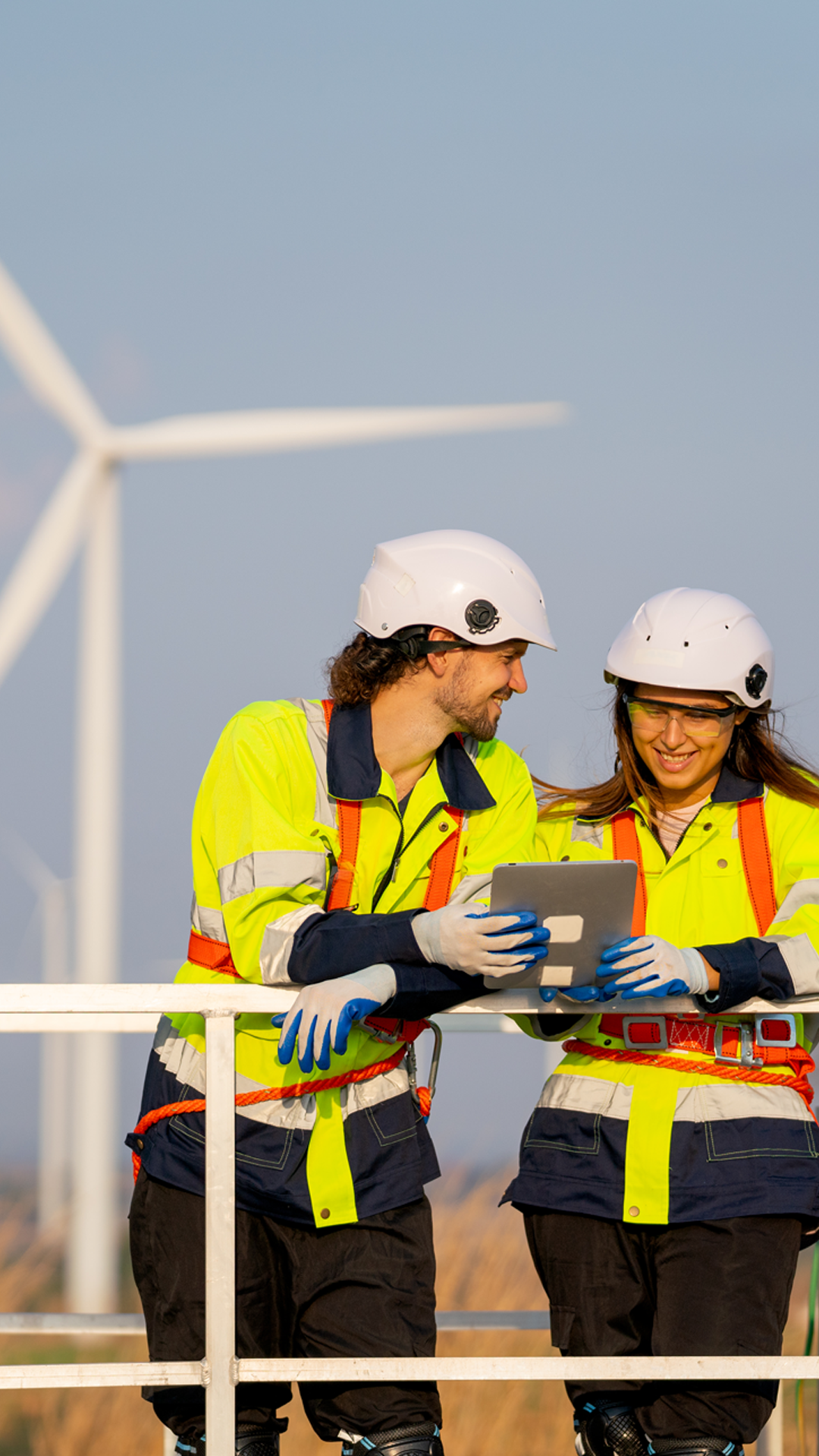 engineer man and woman discuss with happiness together with woman hold tablet