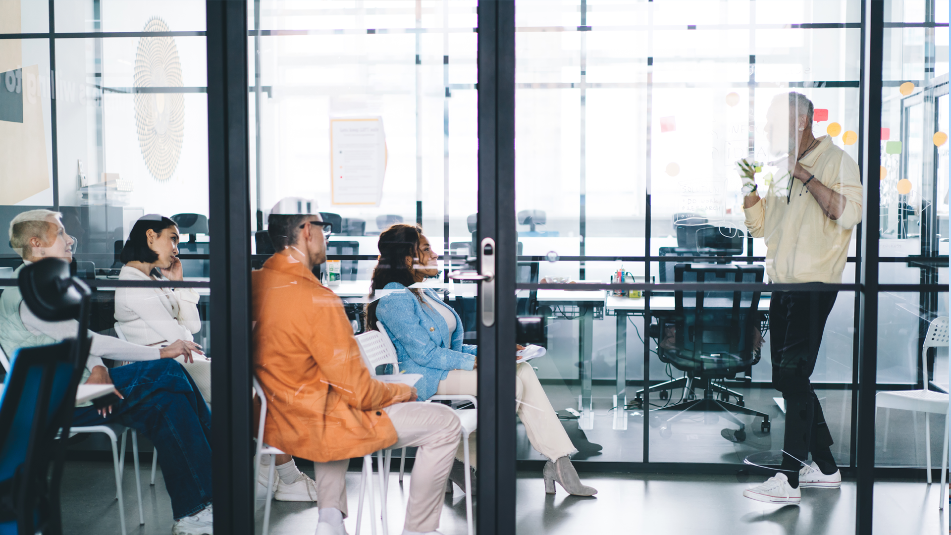 Businesspeople on workshop in spacious office